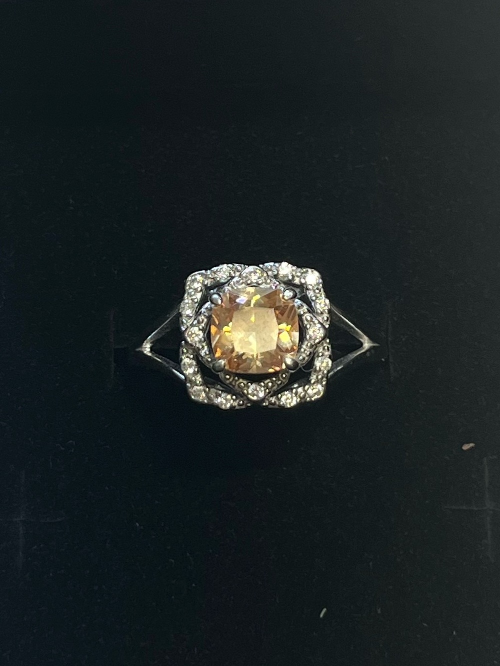 Sterling silver ring with peach orange stone. Stamped 925